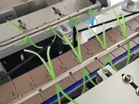 Étiqueteuse automatique pour manchons thermo-rétractables